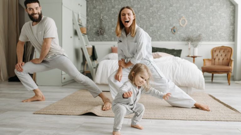 A joyful family engaging in morning stretches together, fostering a fun and healthy routine.